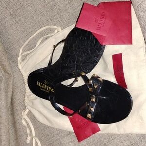 Valentino Garavani Black Sandals with Gold Accents